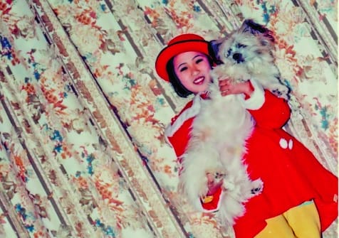 Young Xiaoxi with pet dog